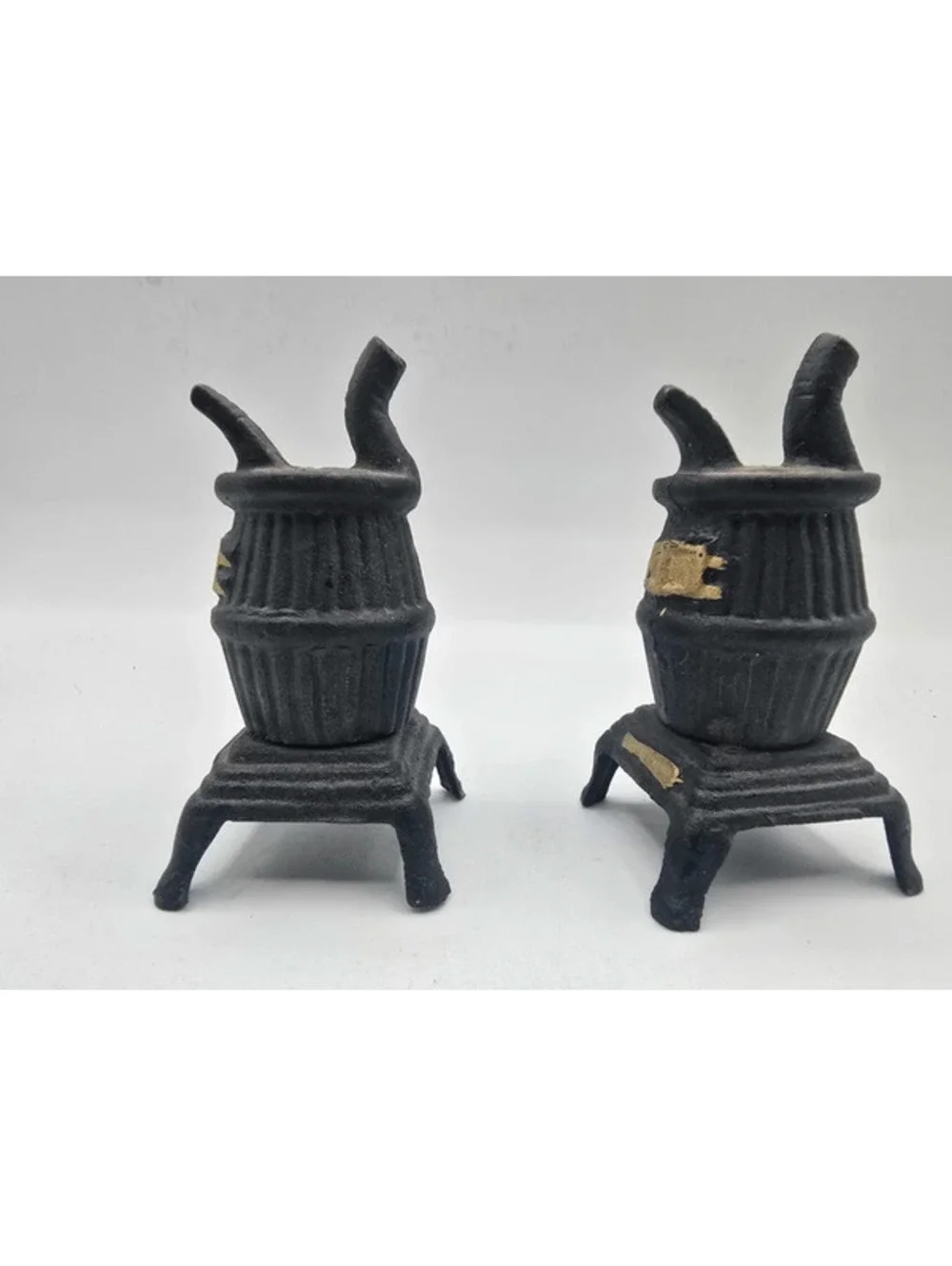 Vintage plastic pot belly stove salt and pepper shakers
